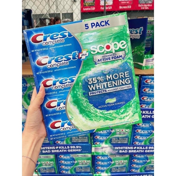 1cây Kem đánh răng Crest extra whitening+ scoop.