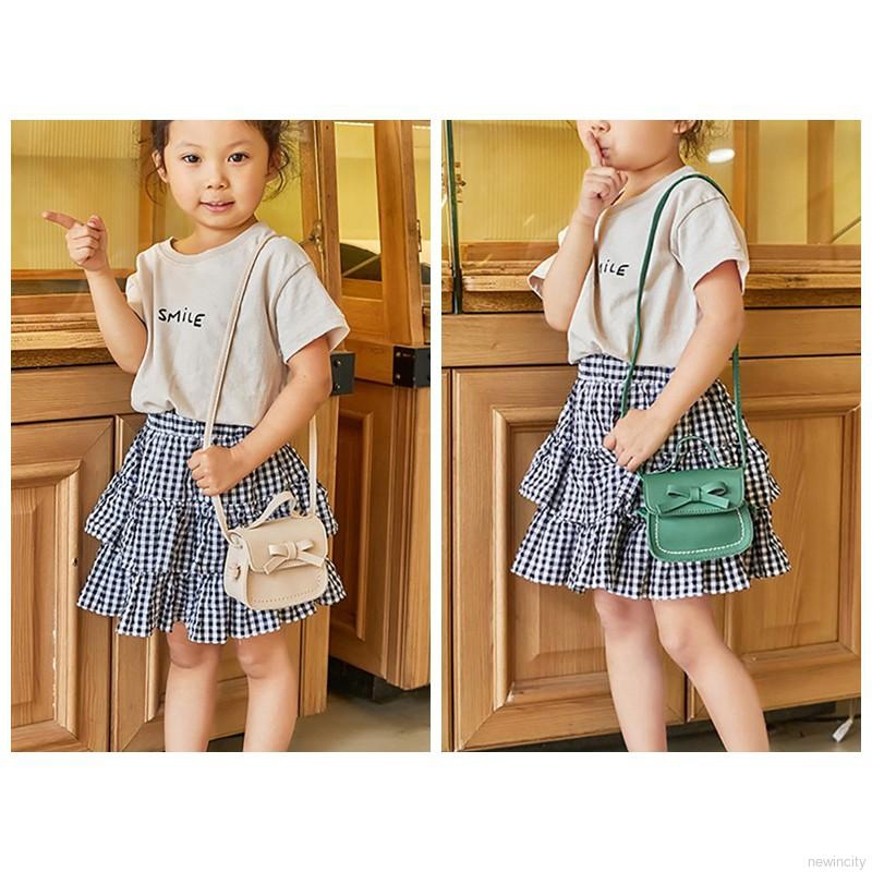 Túi đeo chéo mini đính nơ dễ thương cho bé gái