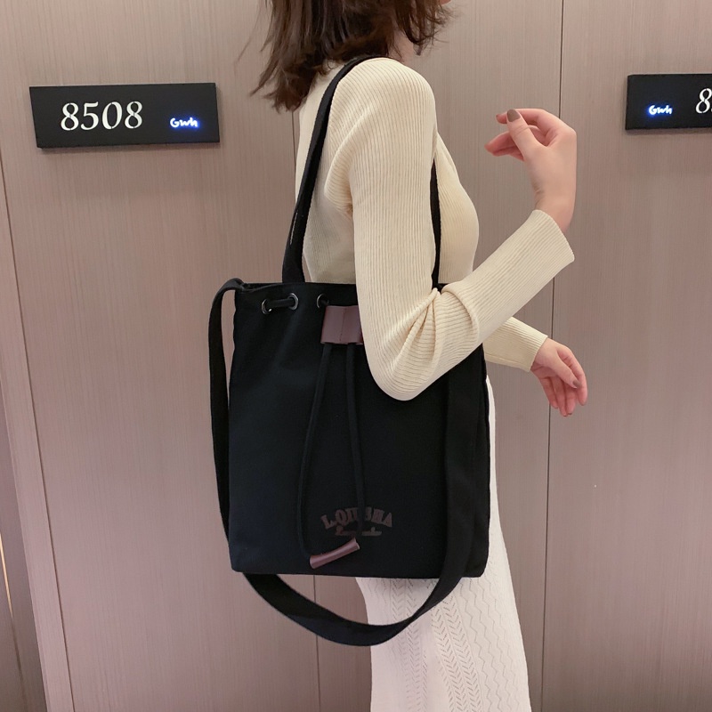 Túi Đeo Vai Vải Canvas Dây Rút Sức Chứa Lớn Mẫu Mới Dễ Phối Đồ Cho Nữ Sinh