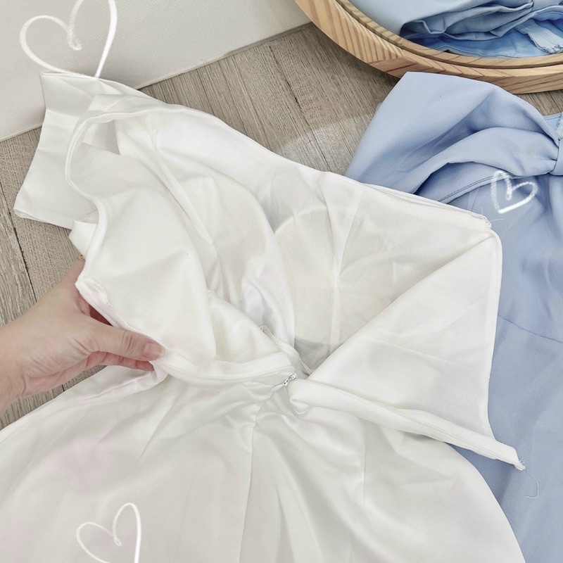 Đầm nơ ngực lệch vai trễ vai trắng xanh