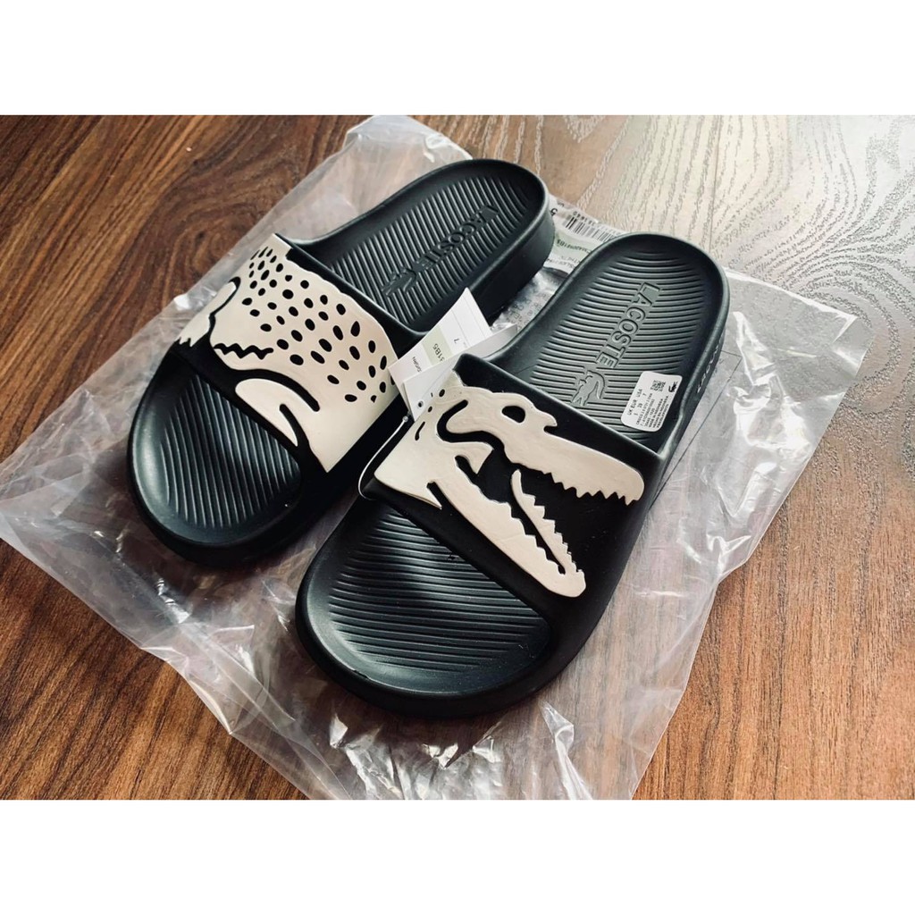 Dép đúc đen in cá trắng