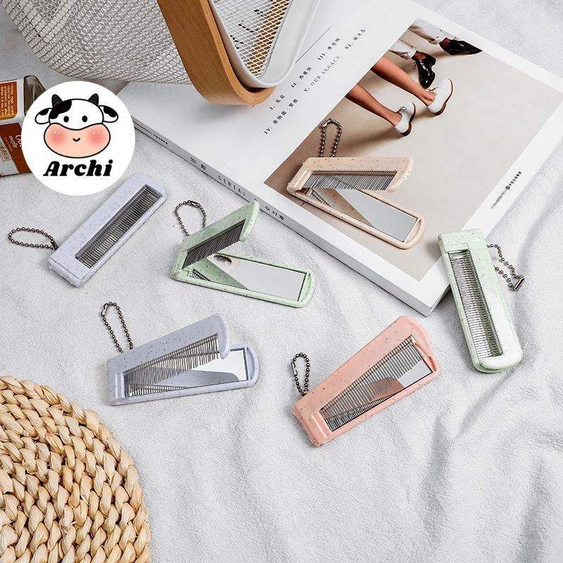 Gương gấp cầm tay kèm lược kim loại