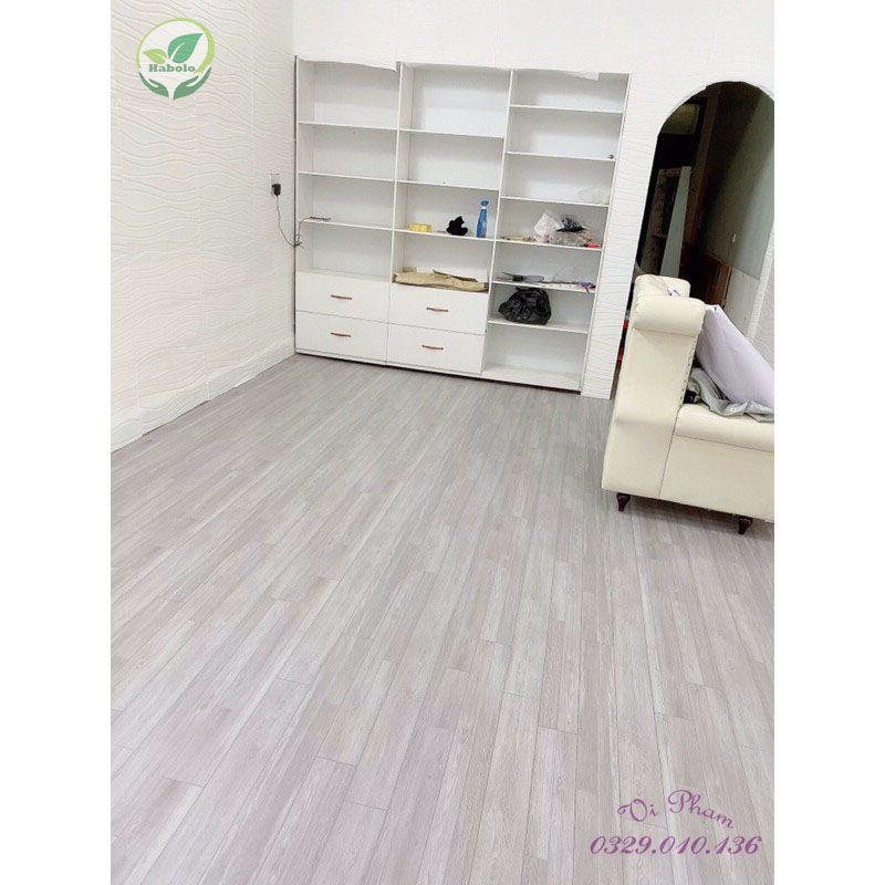 Thảm trải sàn - Thảm lót sàn bằng simili vân gỗ màu xám trắng đủ kích thước và cắt theo yêu cầu.