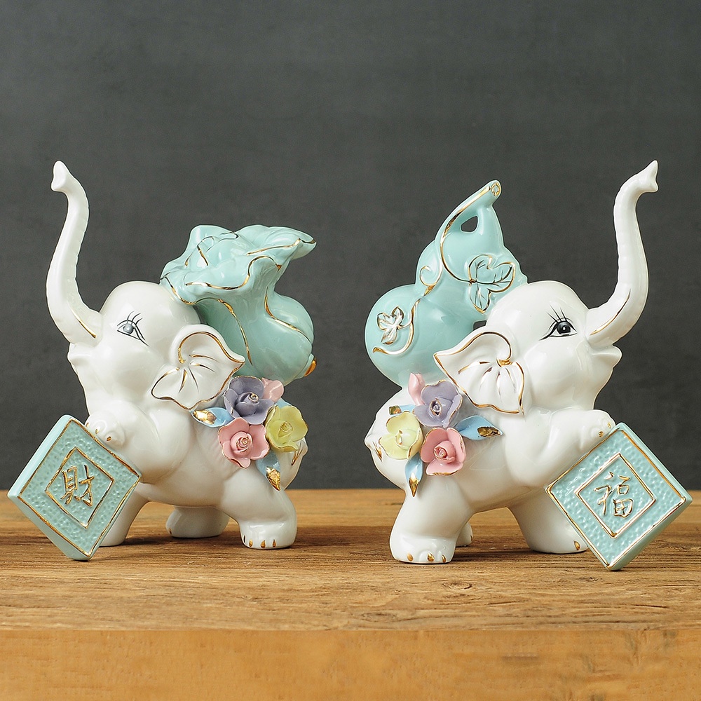 Set tượng đôi voi gốm sứ và bình hoa trang trí phòng sang trọng