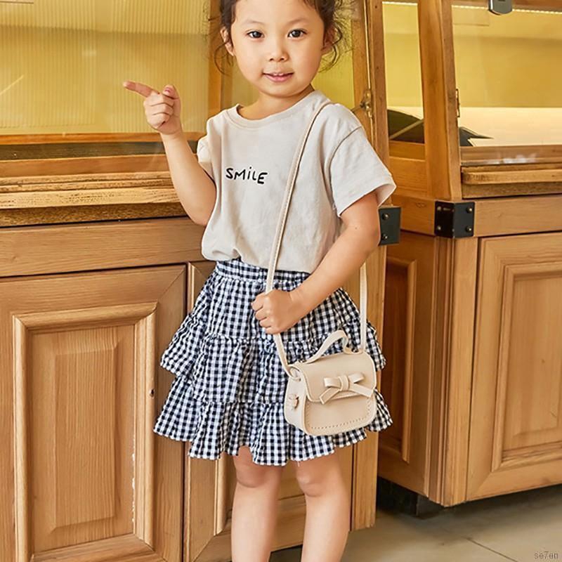 Túi đeo chéo mini đính nơ sành điệu cho bé gái
