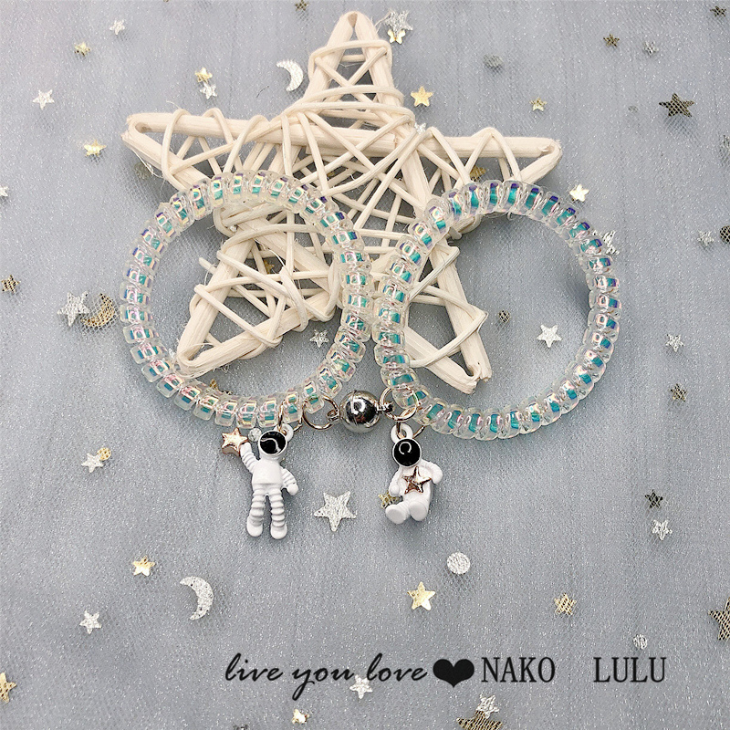 Dây thun cột tóc nam châm hình phi hành gia cho cặp đôi