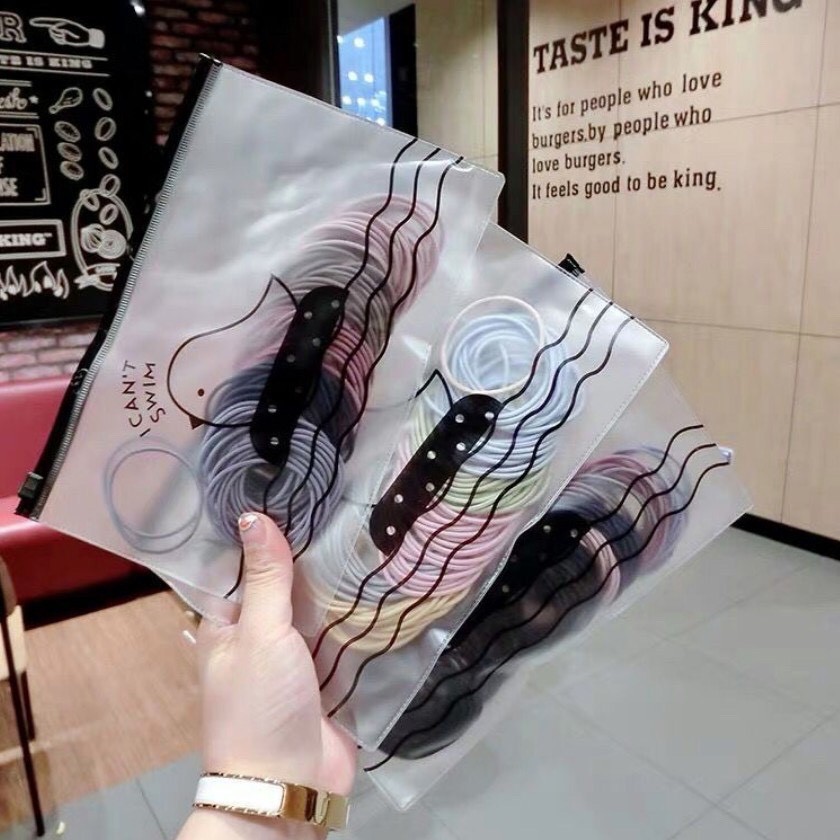 Set 100 Dây Cột Tóc Co Giãn Kèm Túi Zip