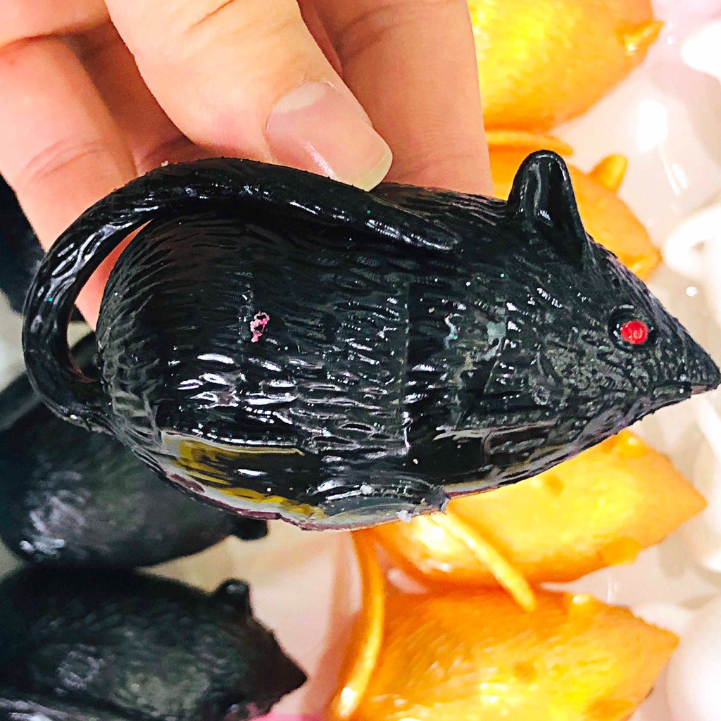 Đồ chơi Gudetama bóp trút giận con chuột đen ghớm ghiếc