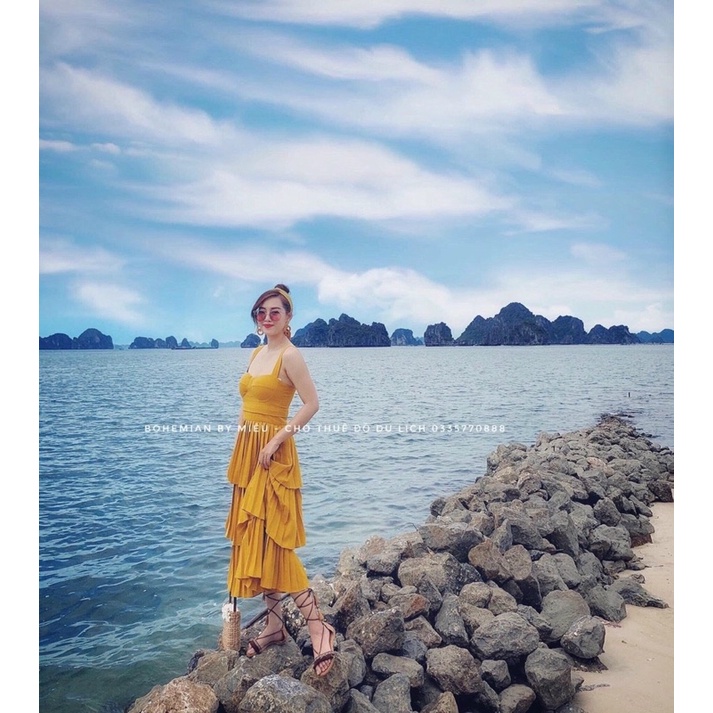 G9  - đầm xoè vàng dập tầng nơ vai