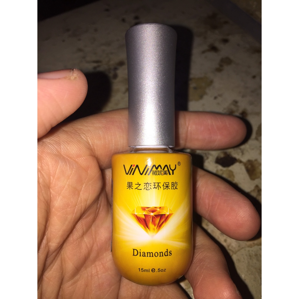 * Chuyên sản xuất cung cấp sỉ và lẻ toàn quốc *  Top cứng móng VINIMAY chai vàng rất đẹp dung tích chai 15ml.