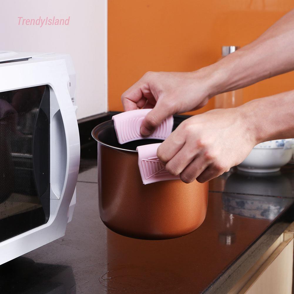 Miếng Nhấc Nồi Chảo Bằng Silicon Cách Nhiệt Thiết Kế Tiện Dụng