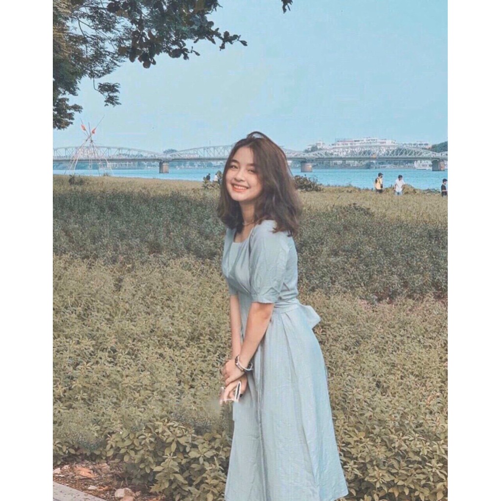 Đầm xanh dài cổ tròn thắt nơ eo