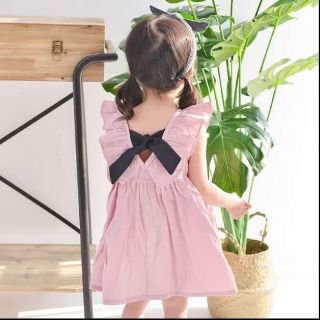 Váy buộc nơ bé gái qc