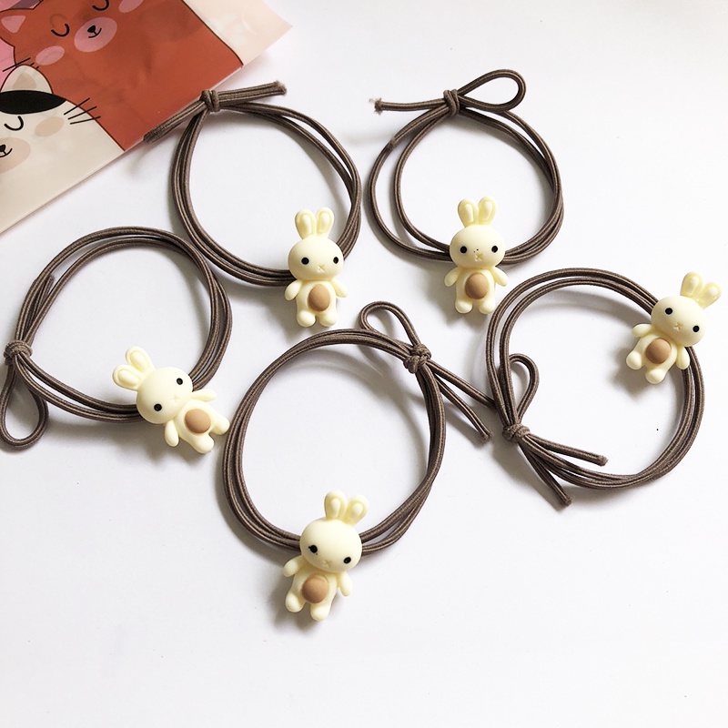 01 Cột tóc thỏ kem xinh xắn DTonline M85