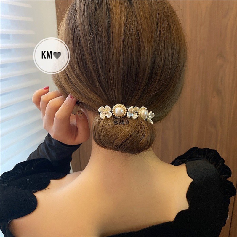 Que uốn tóc hình hoa tròn