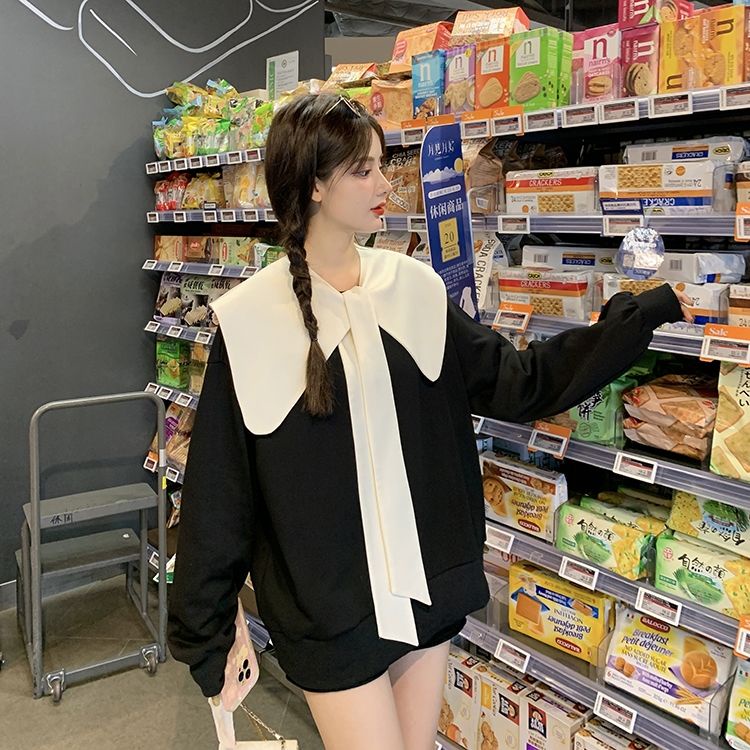 Áo Sweater màu đen đính nơ thời trang mùa thu cho nữ