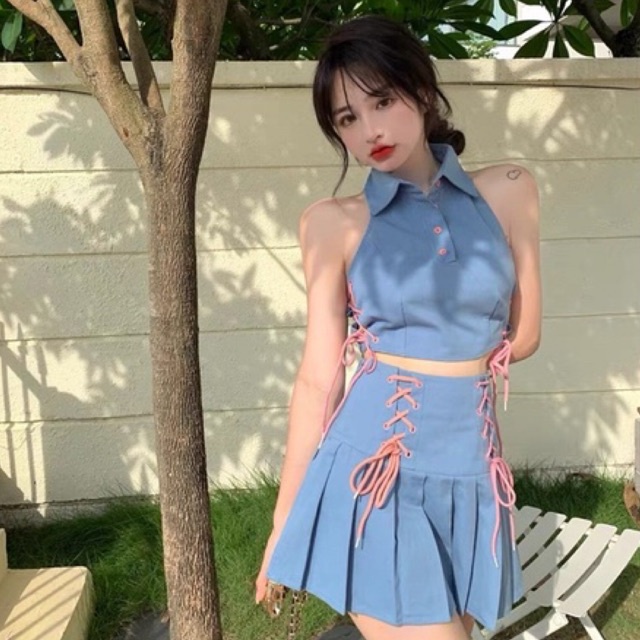 Set Áo Croptop Cổ Sơ Mi Không Tay Và Chân Váy Thắt Nơ Xếp Ly