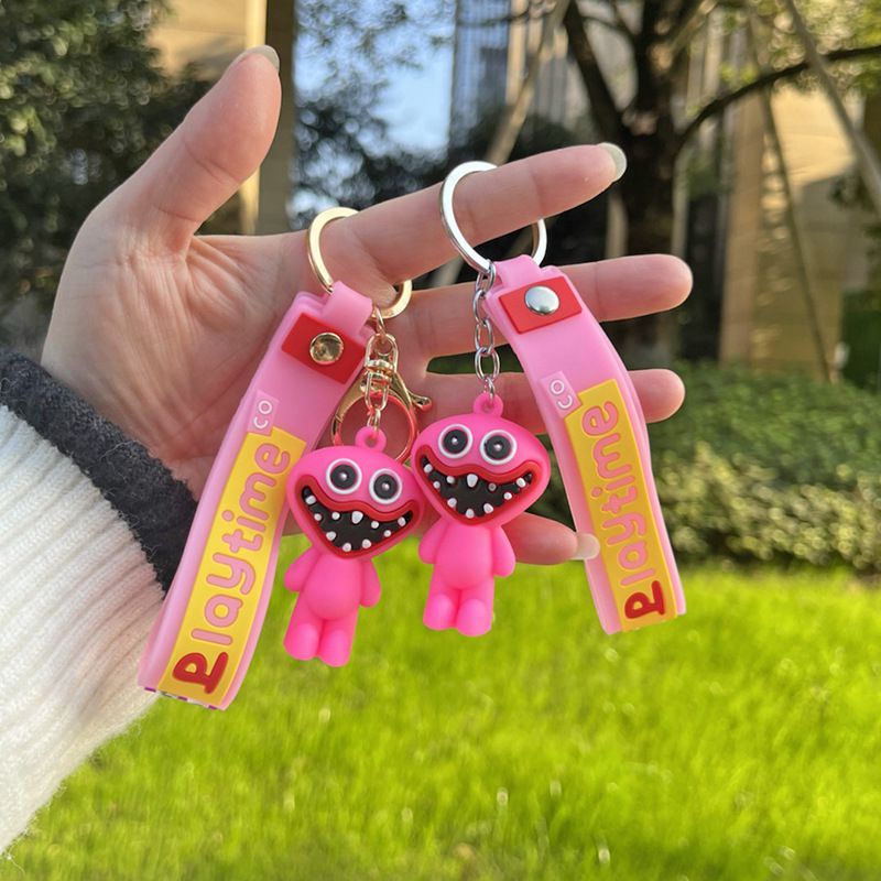 Móc khóa mặt hình nhân vật Huggy Wuggy game Poppy Playtime kiểu nắn bóp giảm căng thẳng dùng làm quà tặng