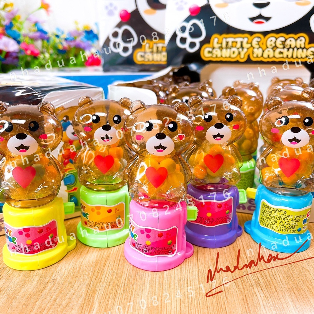 Một lốc gồm 20 cái máy bắn kẹo đồ chơi (kèm kẹo) hình gấu dễ thương Hongkong cái 20gam