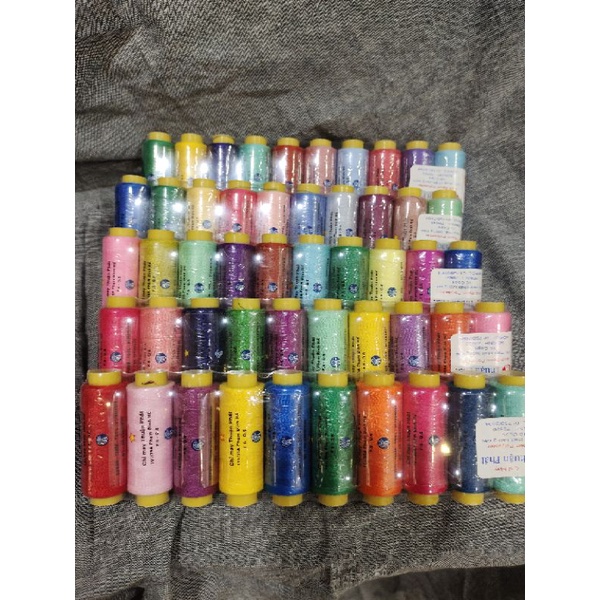 10 cuộn chỉ cotton, loại trắng,đen và 10 màu