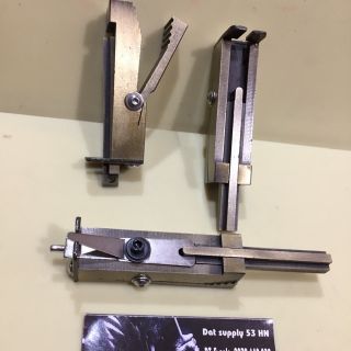Bộ căn chỉnh lưỡi gà máy xăm