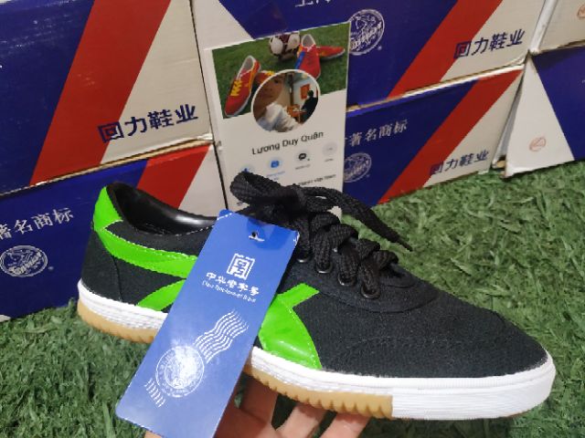 Giày bata warrior đen sọc xanh lá