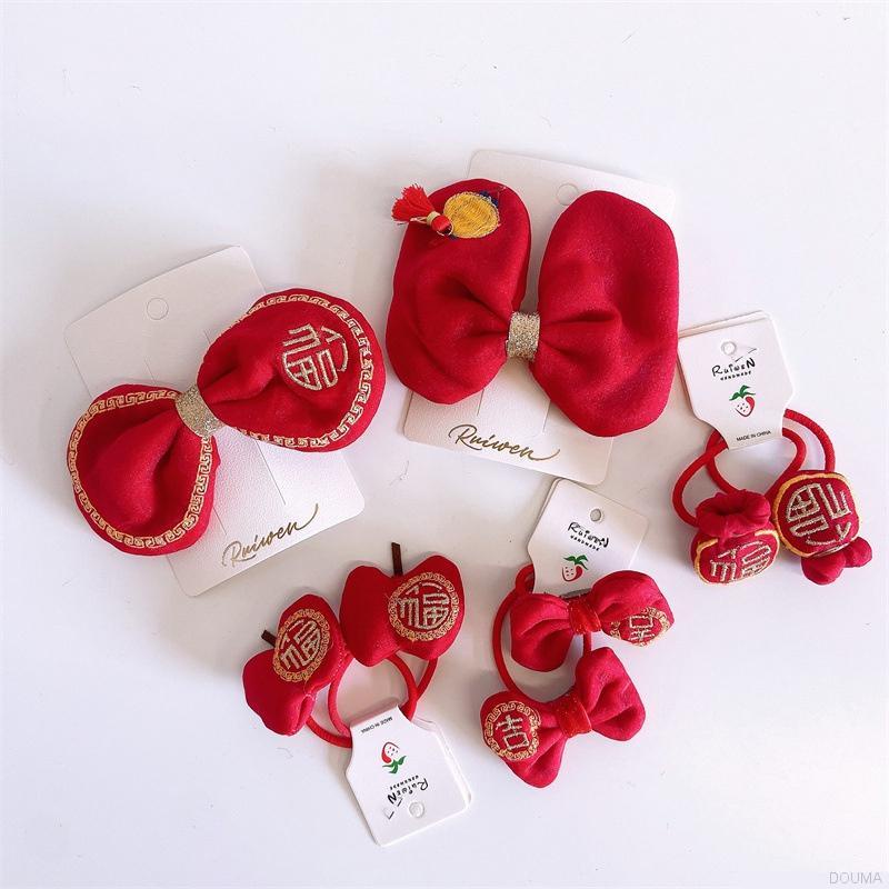 Kẹp tóc hình chúc mừng năm mới đáng yêu cho bé