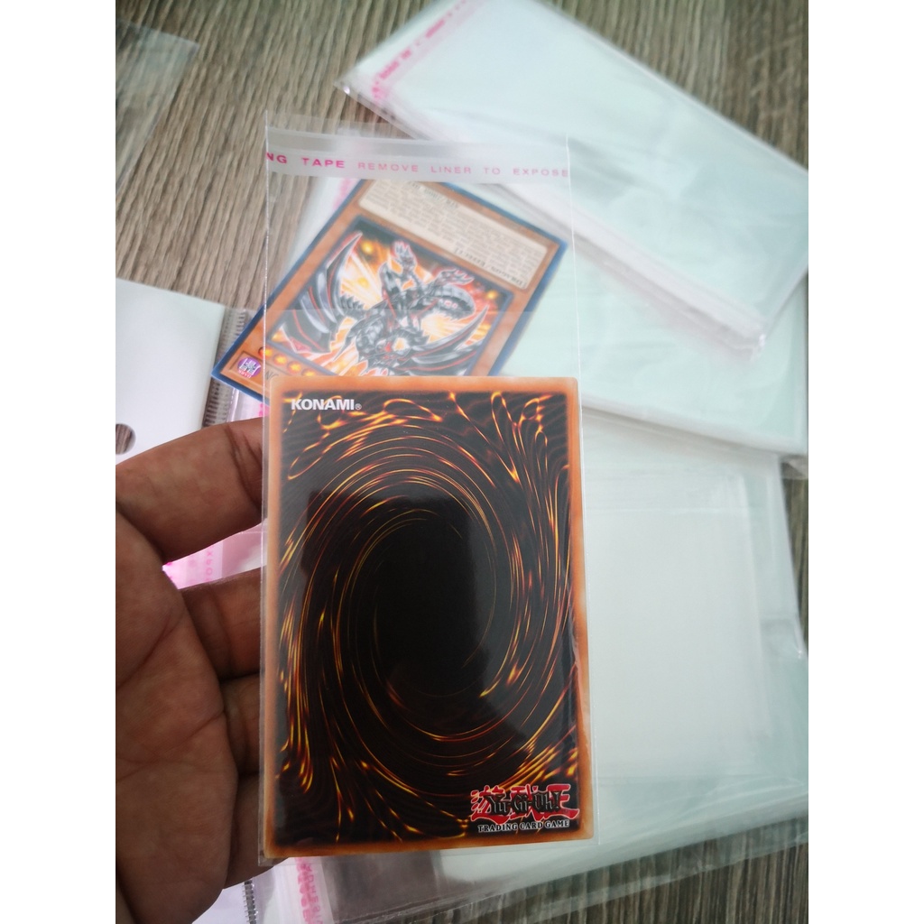 Sleeves - 50 cái Bọc bảo vệ bài Yugioh và các loại thẻ card - loại có keo dán miệng.
