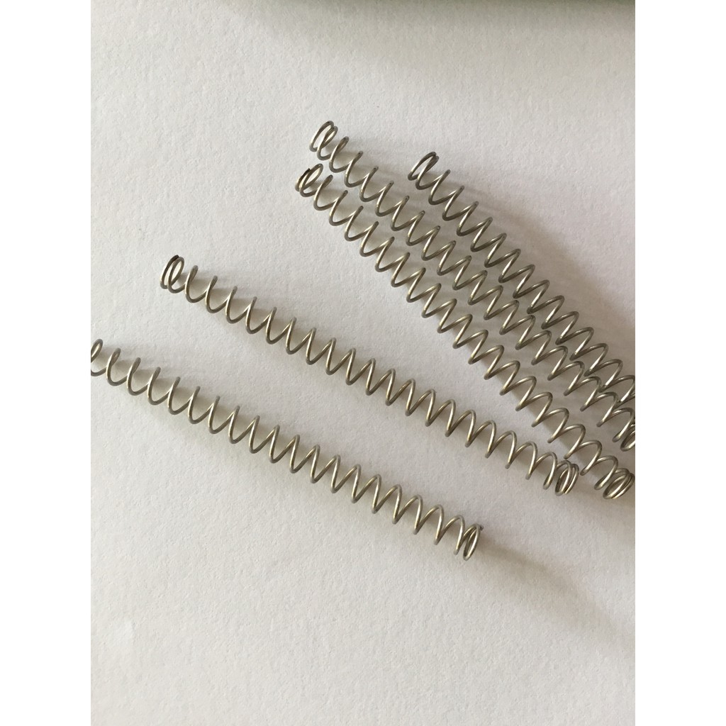 1 chiếc lò xo trục bơm kim tiêm Socorex