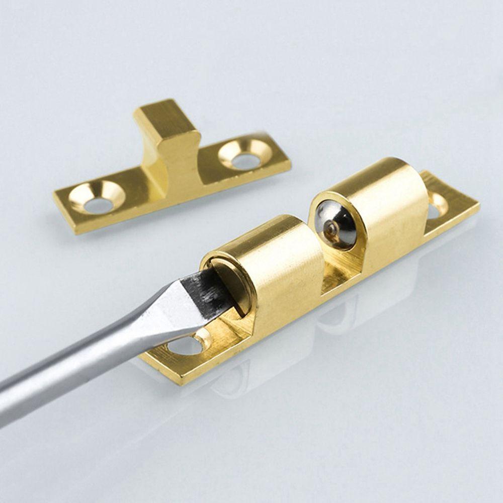 Con Lăn Chặn Cửa Kèm Ốc Vít Cảm Ứng Tiện Dụng Cho Đồ Nội Thất / Tủ Chén