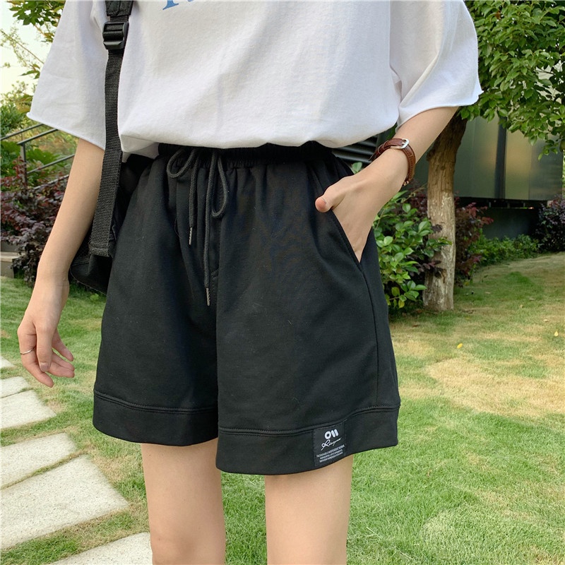 Quần ngắn ống rộng lưng cao màu đen phong cách Hàn Quốc thời trang cho nữ