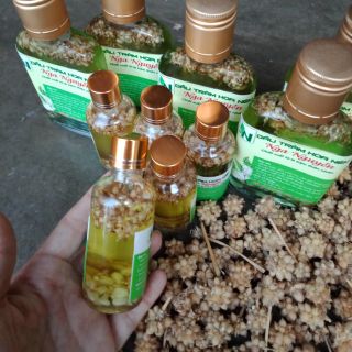 1 chai dầu tràm ngâm hoa ném ( chai tròn 100ml) chuẩn đẹp