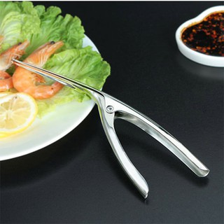 Dụng cụ bóc vỏ tôm