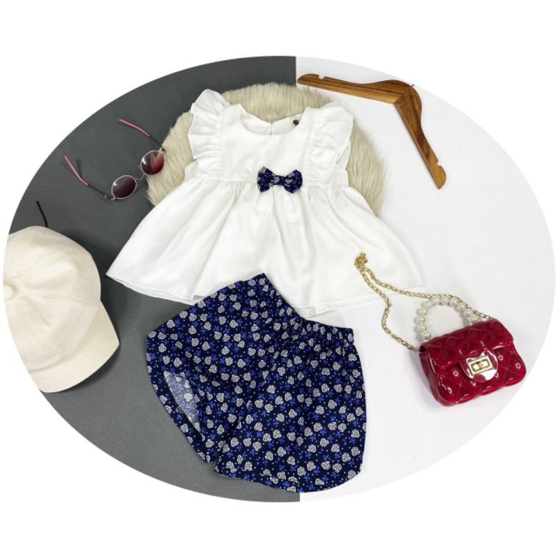 Bộ bé gái áo xòe tay cánh tiên quần đùi hoa