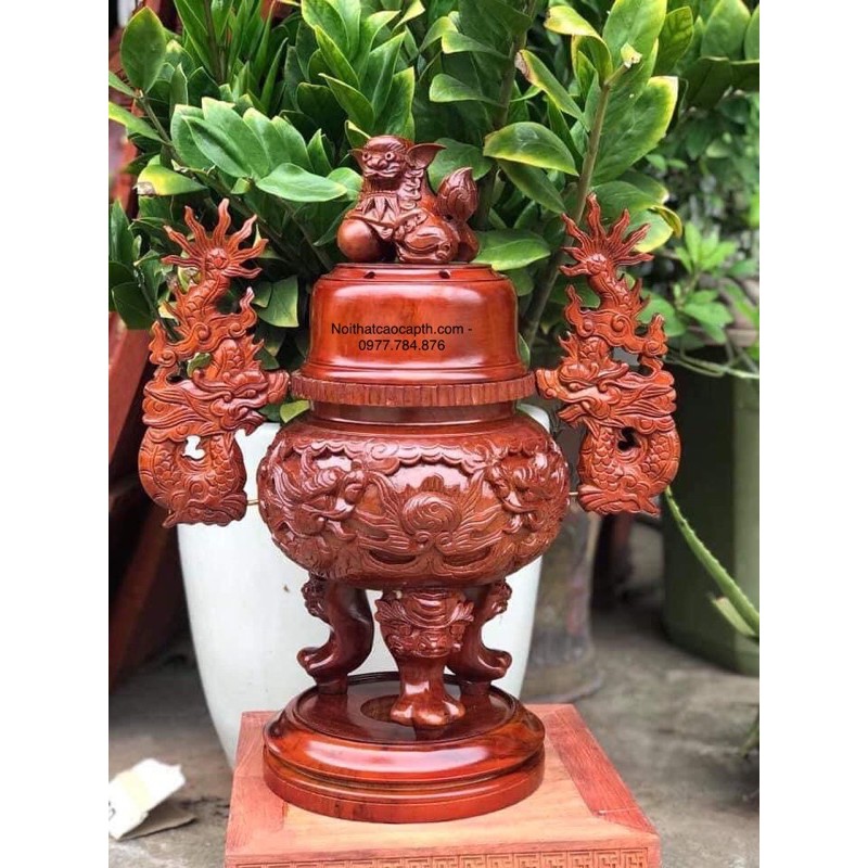 Đỉnh thờ chạm rồng gỗ hương gia lai