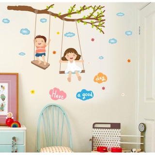 Decal trang trí tường - Bé gái bé trai chơi xích đu