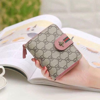 Ví cầm tay con ong nữ