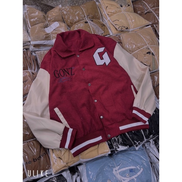 Áo khoác nhung tăm phối tay da lạ mắt in lưng