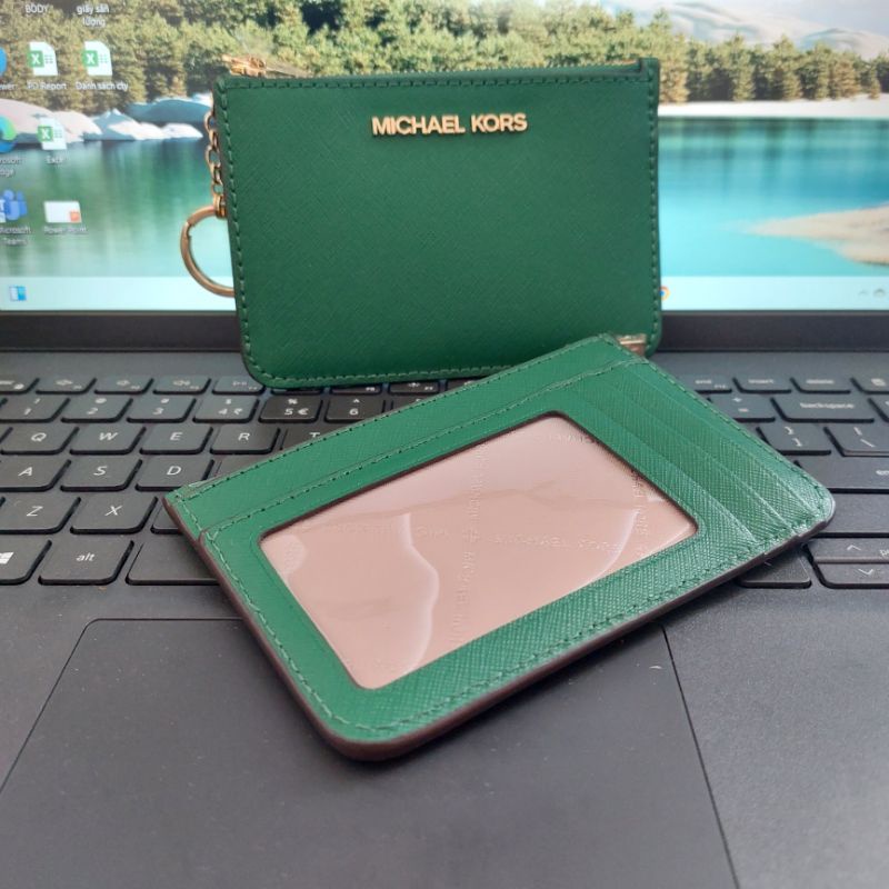Ví cầm tay michael kors