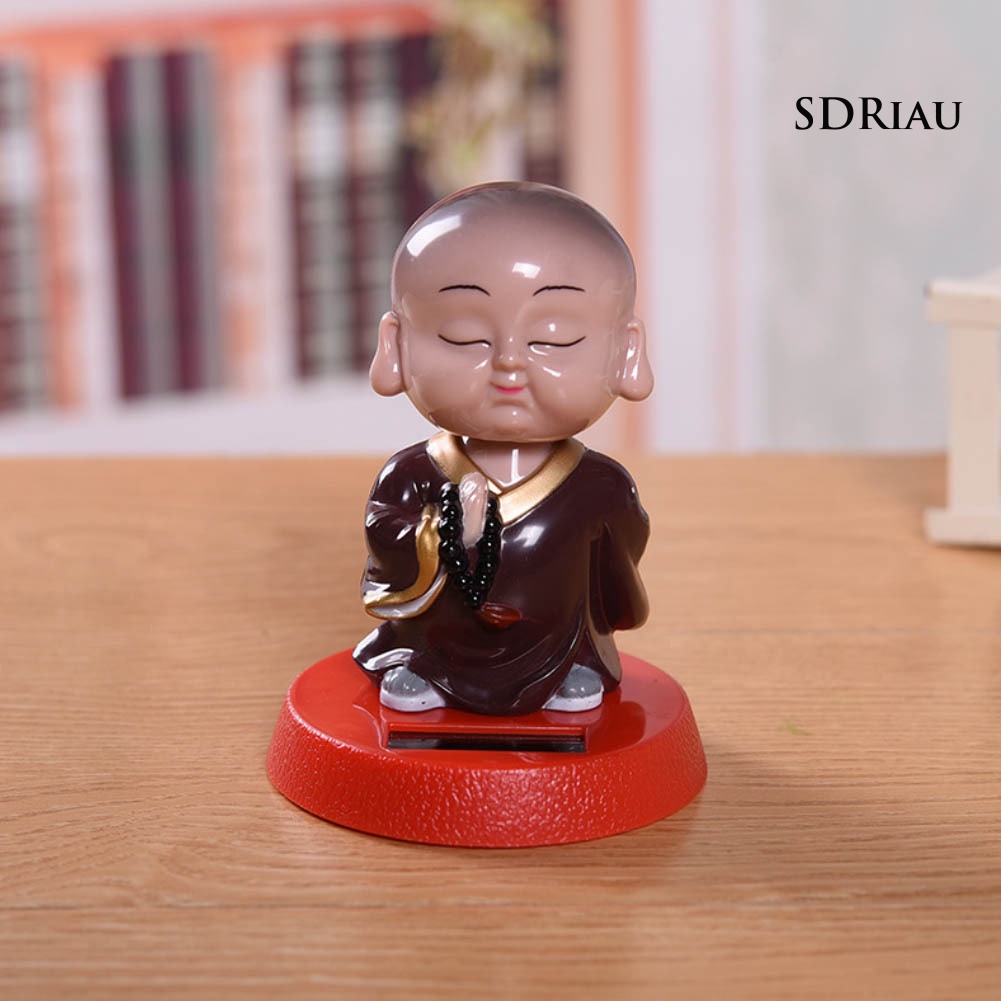 Đồ Chơi Tượng Chú Tiểu Hoạt Hình Sử Dụng Năng Lượng Mặt Trời