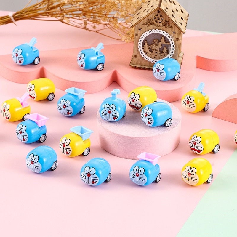 🍉Đồ Chơi Xe Bánh Đà Doraemon Mini 3*5cm DUASHOP.