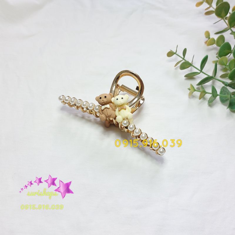 Kẹp tóc dạng T chéo kim loại màu vàng