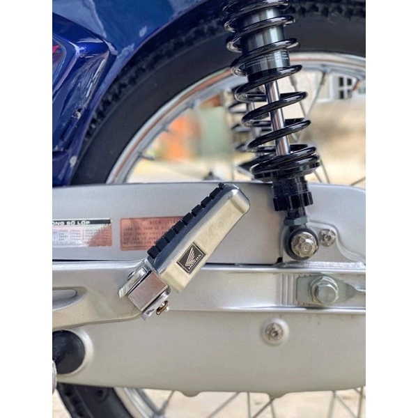Gác chân sau cánh chim Honda / cục xếp gác chân sau