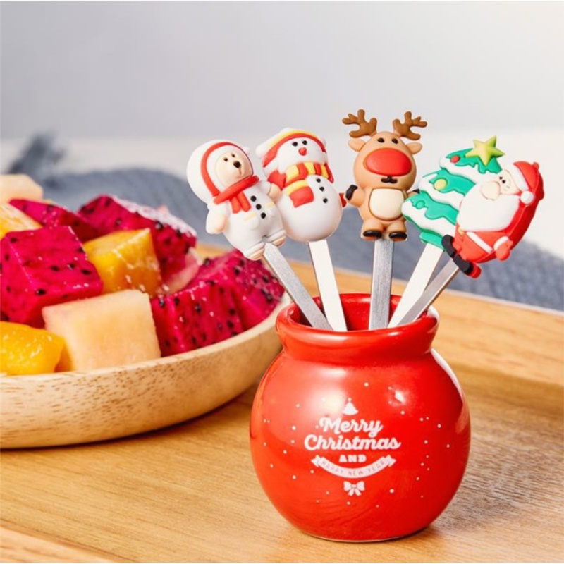 Nĩa ăn trái cây bằng sứ và silicone thiết kế hình ông già noel sáng tạo ngộ nghĩnh