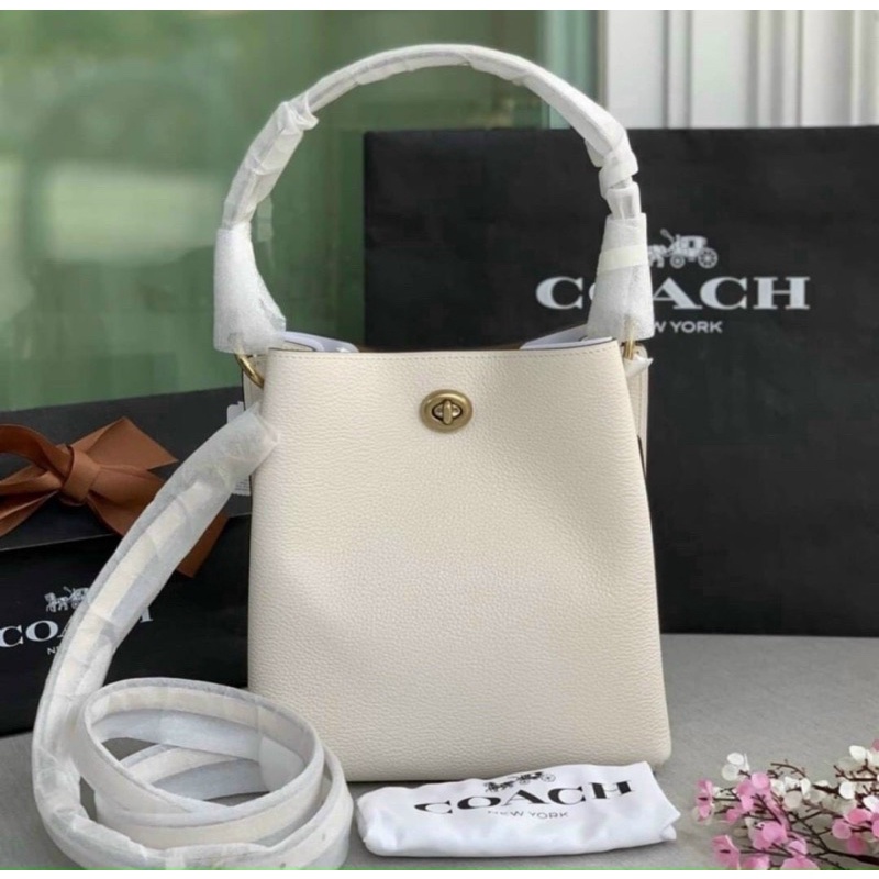 Túi Coach trắng