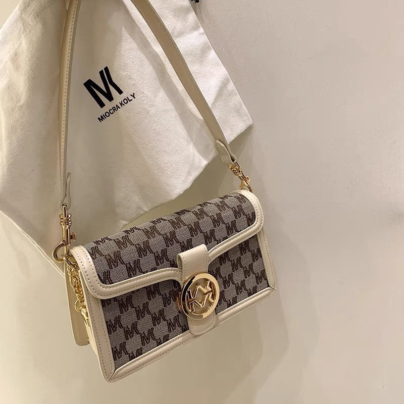 Túi 𝐌𝐢𝐨𝐜𝐫𝐚 𝐤𝐨𝐥𝐲 nền logo khoá vàng