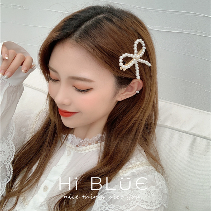 Kẹp tóc hình nơ đính ngọc trai đẹp mắt cho nữ