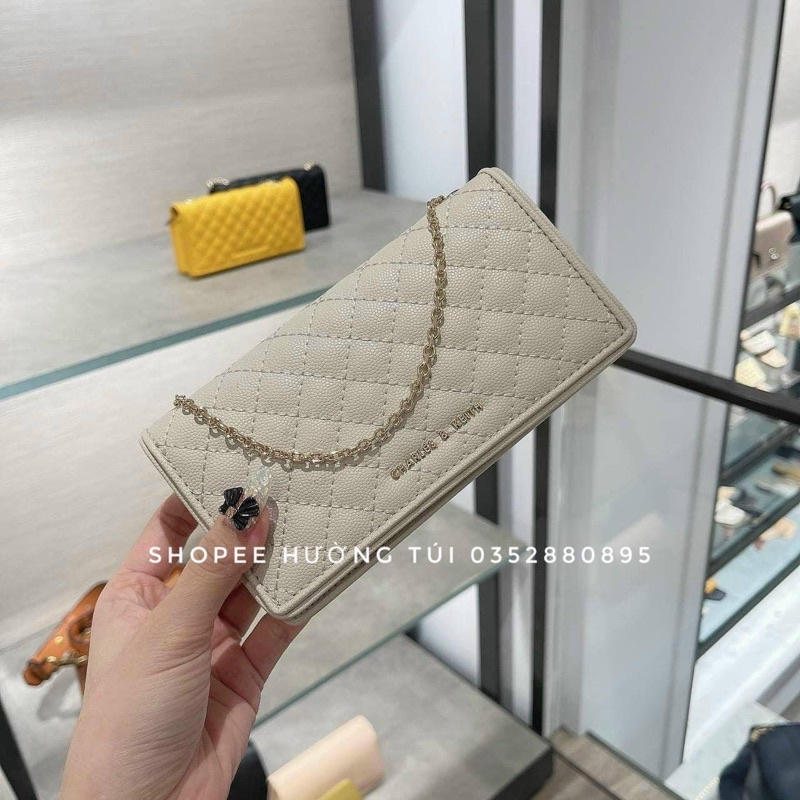 Túi Cê Kaa trám dài ô có dây đeo chéo size 17(có hộp)