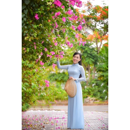 Áo dài đín nút phối xinh