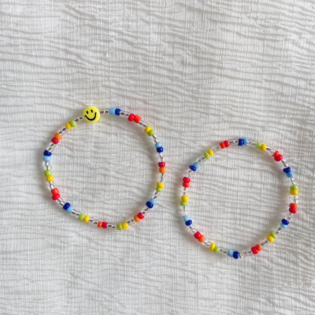 Vòng tay handmade cườm màu/hình mặt cười